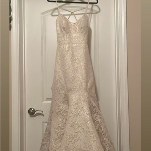 La Femme size 6 mermaid style fit with rose patterns